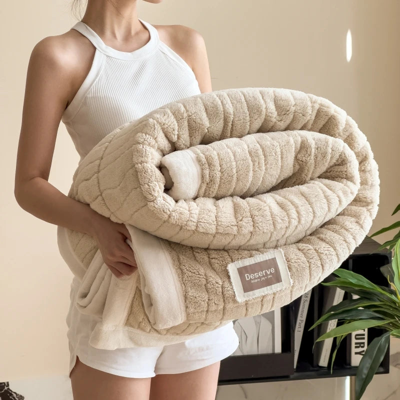 The Original Plush in Oat, held rolled up